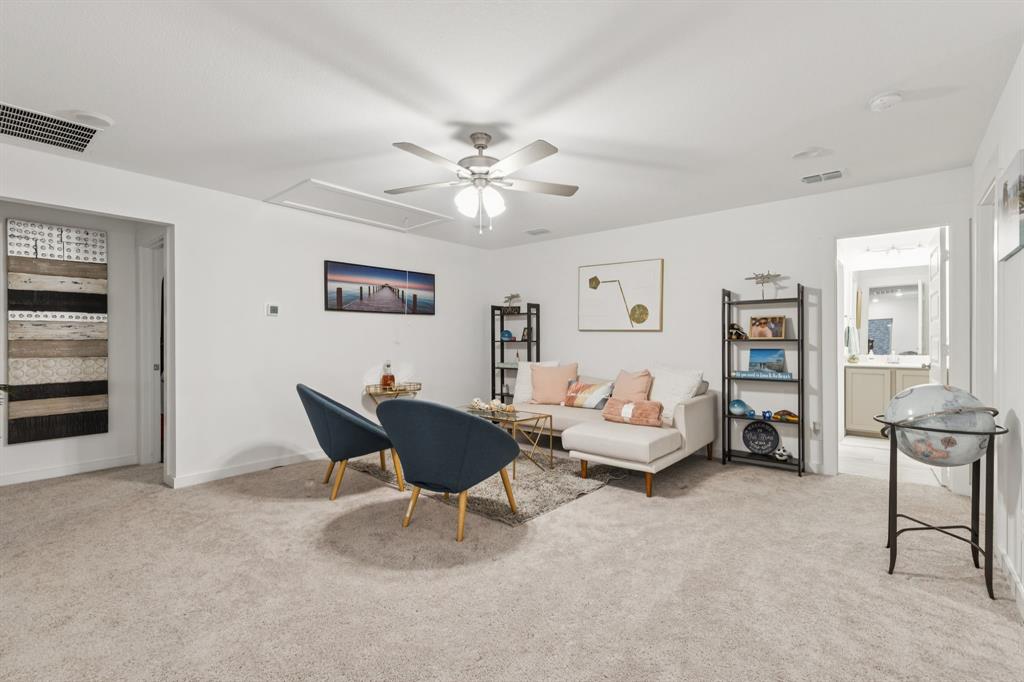 1238 Beaumont Lane Red Oak, TX 75154 - Photo 15 of 29 a living room with furniture and white walls