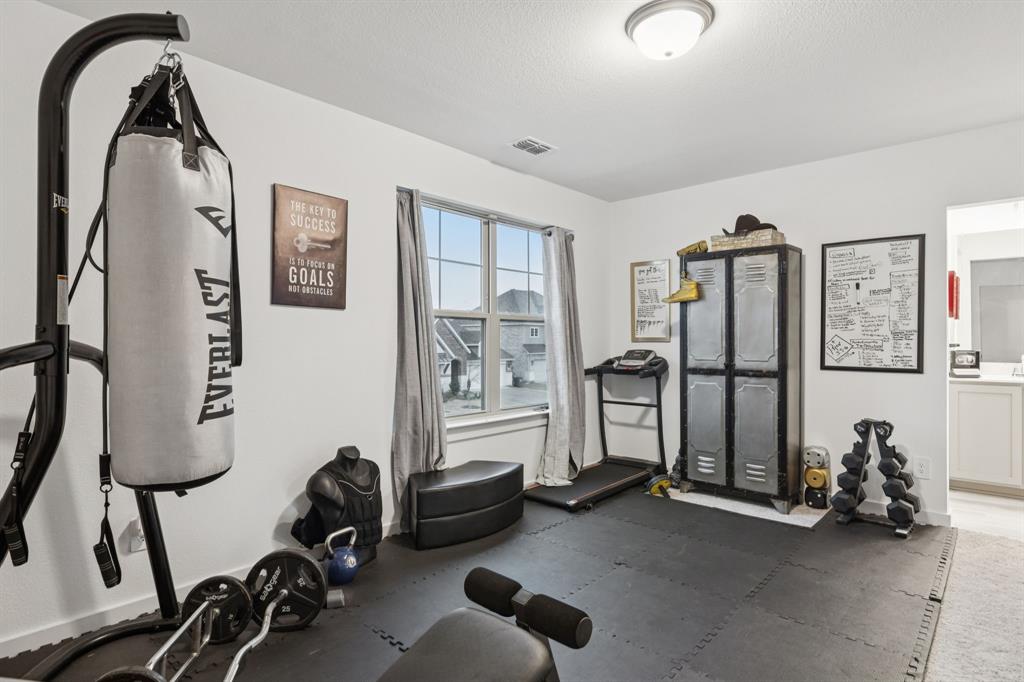 1238 Beaumont Lane Red Oak, TX 75154 - Photo 21 of 29 a view of a livingroom with workspace and a window