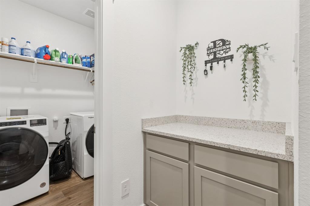 1238 Beaumont Lane Red Oak, TX 75154 - Photo 24 of 29 a utility room with dryer and washer