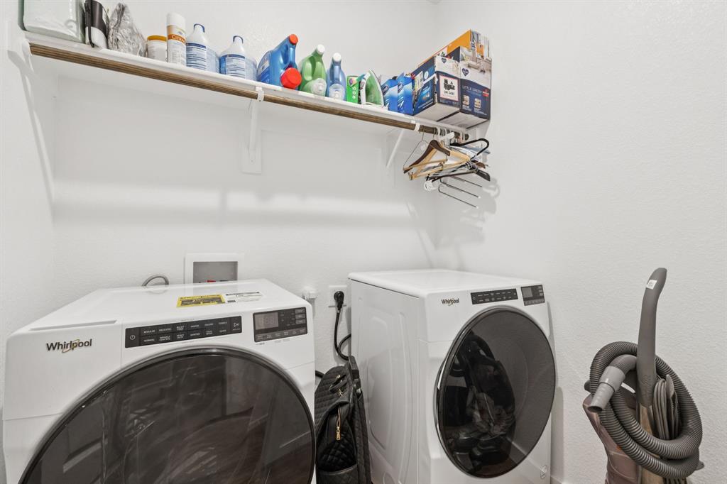 1238 Beaumont Lane Red Oak, TX 75154 - Photo 25 of 29 a utility room with dryer and washer