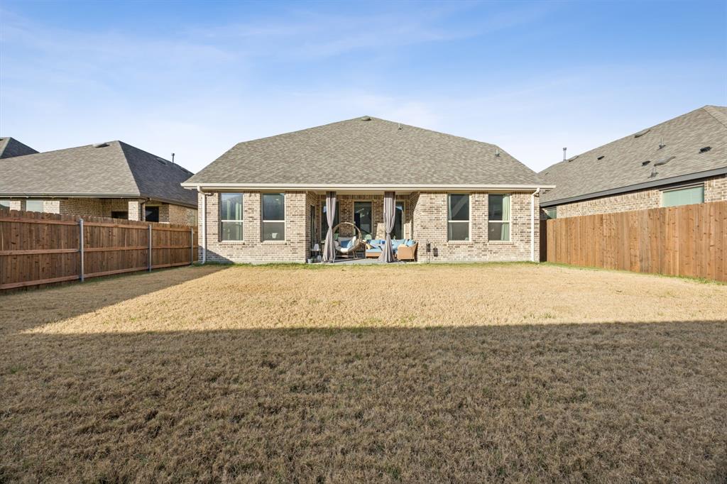 1238 Beaumont Lane Red Oak, TX 75154 - Photo 28 of 29 a front view of a house with a yard
