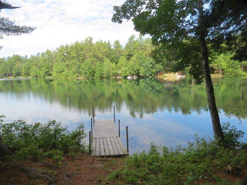 91 Coffee Pond Road Casco, ME 04015 - Photo 30 of 35 View of dock overlooking beautiful...