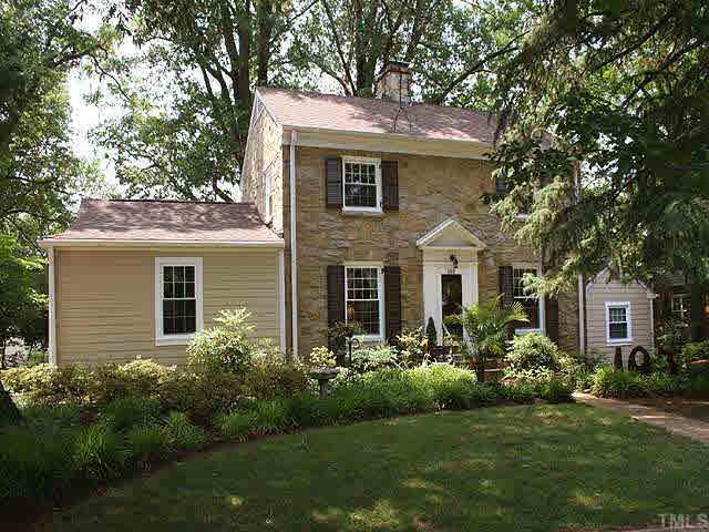 103 Montgomery Street Raleigh, NC 27607 - Photo 1 of 10 a front view of a house with a yard and trees