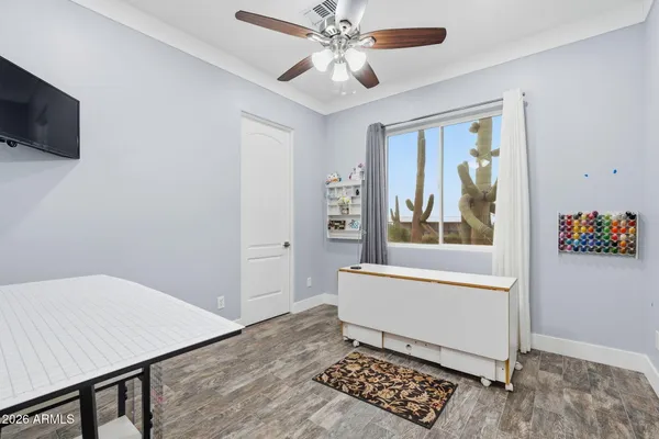 a view of a swimming pool with a table and chairs