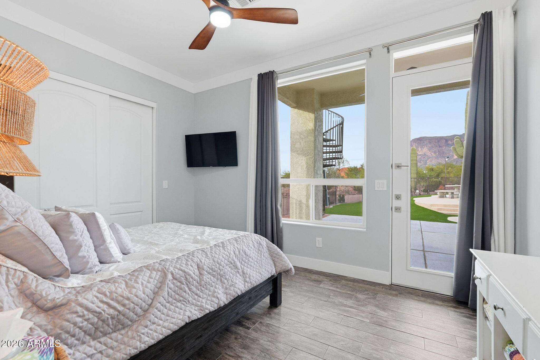 1067 South Trigger Court Apache Junction, AZ 85119 - Photo 32 of 60 a bedroom with a bed and a window