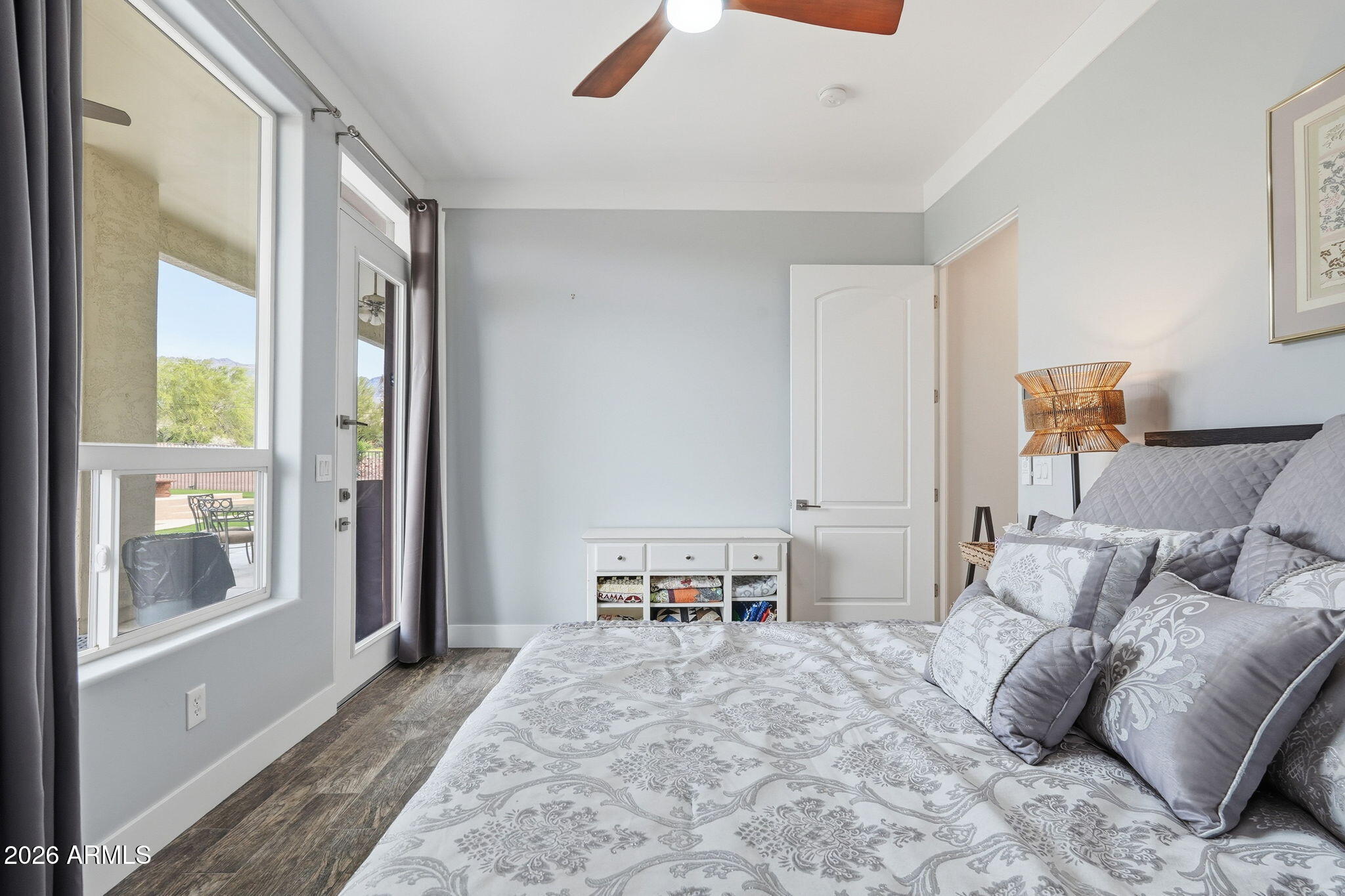 1067 South Trigger Court Apache Junction, AZ 85119 - Photo 33 of 60 a bedroom with furniture and a window