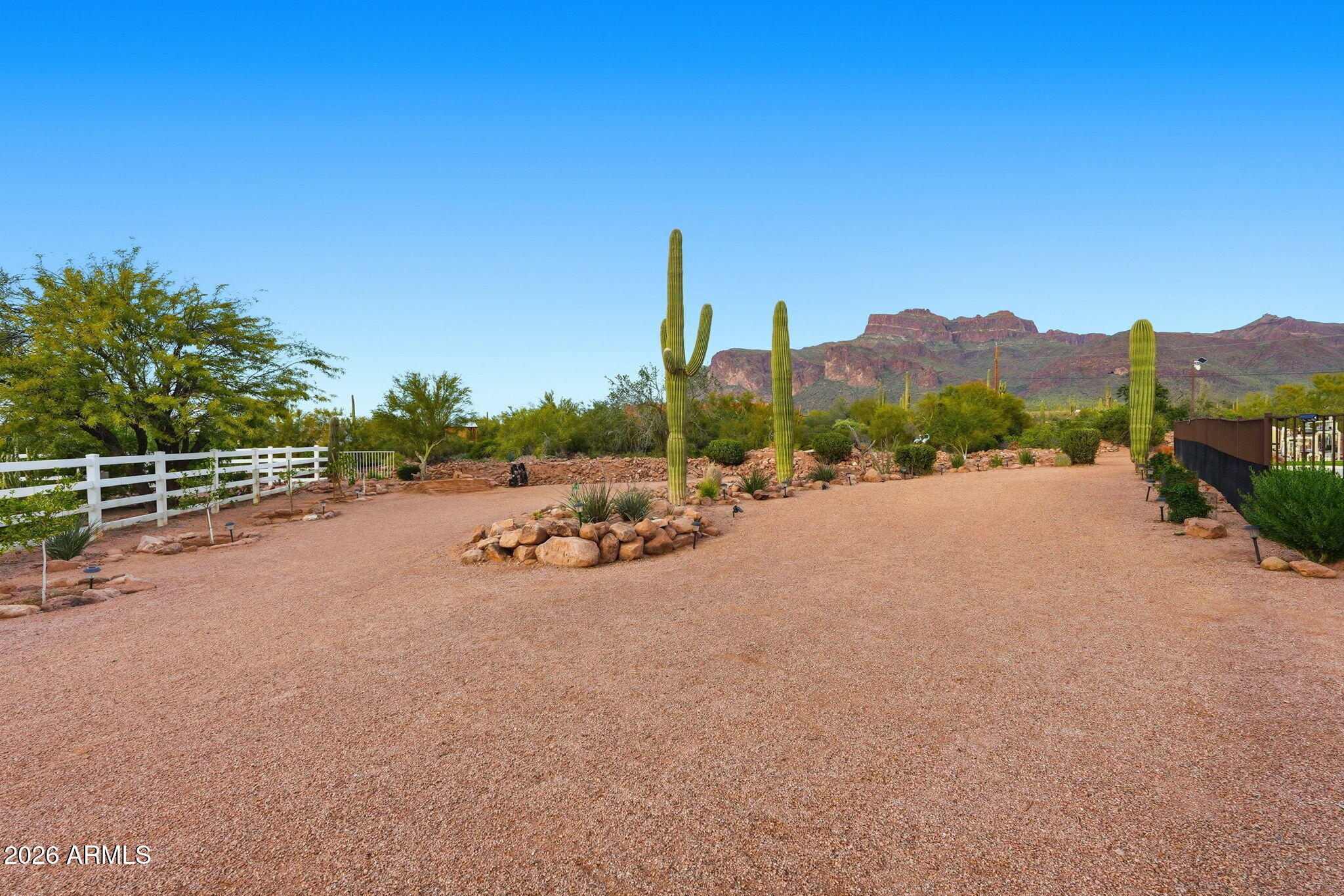 1067 South Trigger Court Apache Junction, AZ 85119 - Photo 59 of 60 a view of a street with a houses