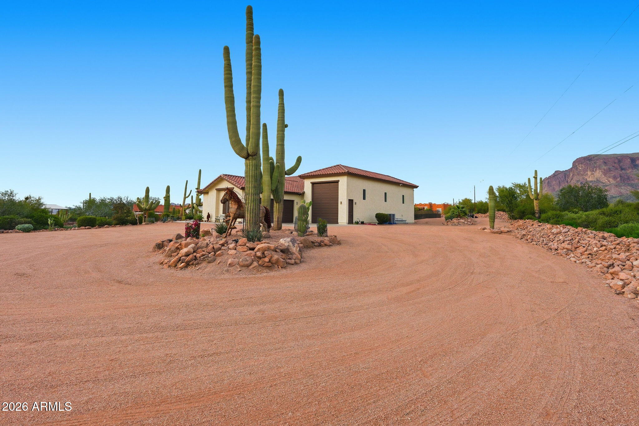 1067 South Trigger Court Apache Junction, AZ 85119 - Photo 7 of 60 a view of a lake with a big yard