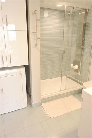 8 Museum Way, Unit 1201 Cambridge, MA 02141 - Photo 13 of 25 a bathroom with a bathtub and a shower