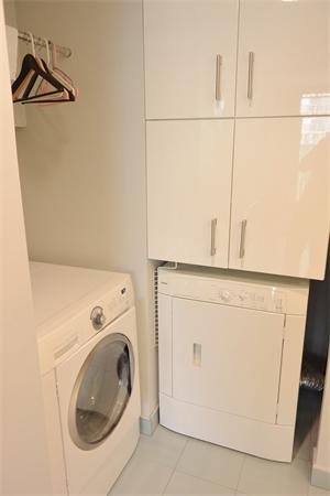 8 Museum Way, Unit 1201 Cambridge, MA 02141 - Photo 15 of 25 a utility room with dryer and washer