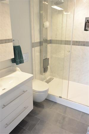 8 Museum Way, Unit 1201 Cambridge, MA 02141 - Photo 10 of 25 a bathroom with a bathtub and a shower