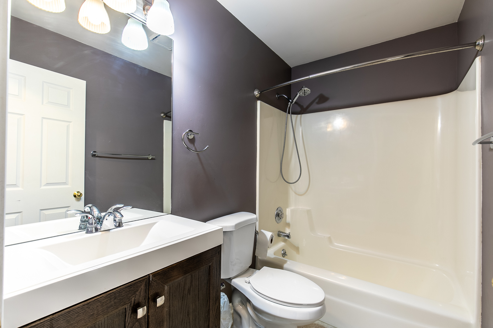 559 Cross Road Gurnee, IL 60031 - Photo 20 of 27 a bathroom with a double vanity sink toilet mirror and shower