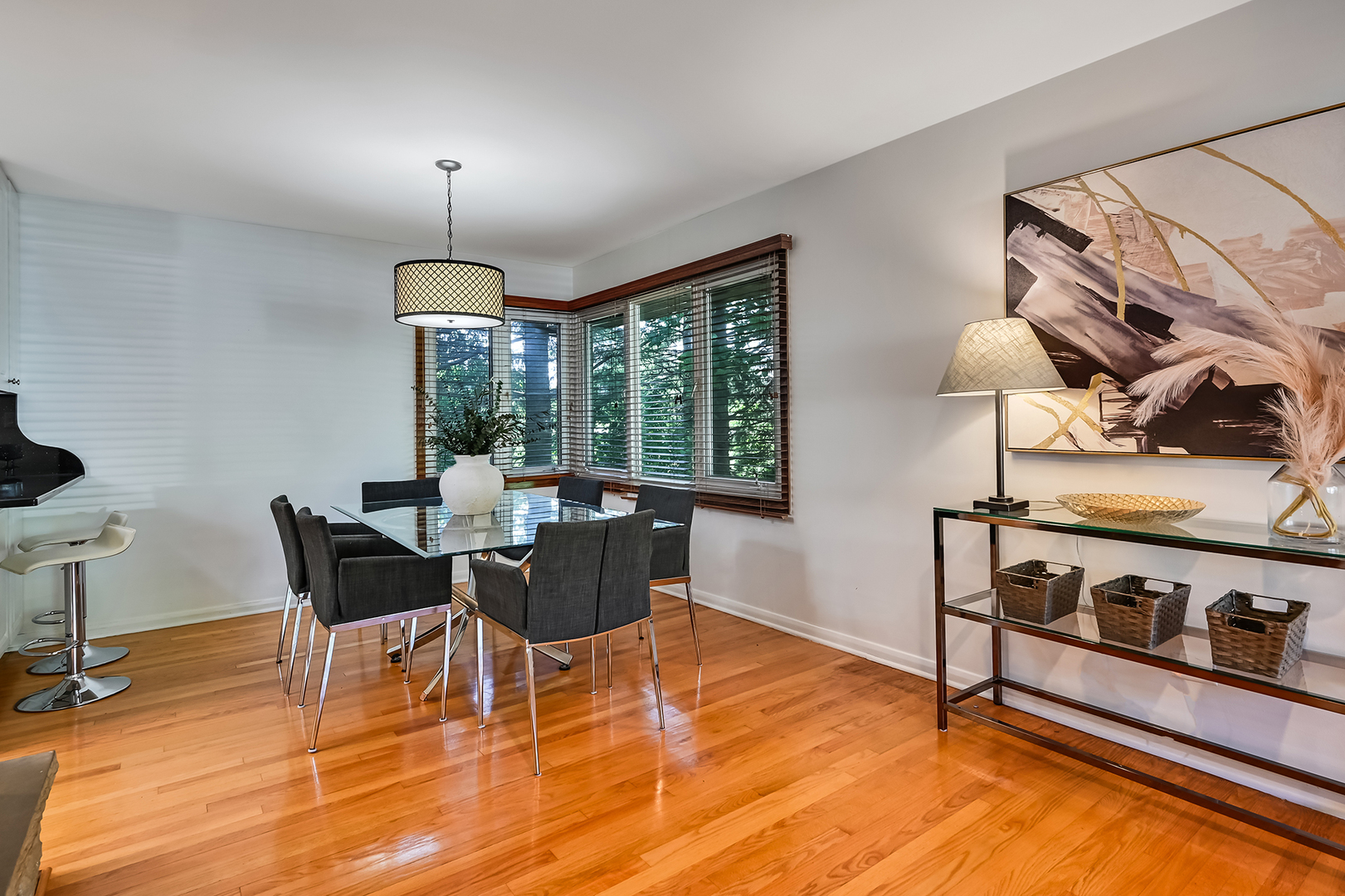 545 Highland Road Hinsdale, IL 60521 - Photo 5 of 29 a dining room with furniture a chandelier and wooden floor