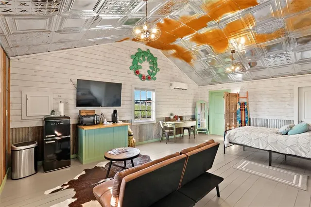 a view of a balcony with furniture