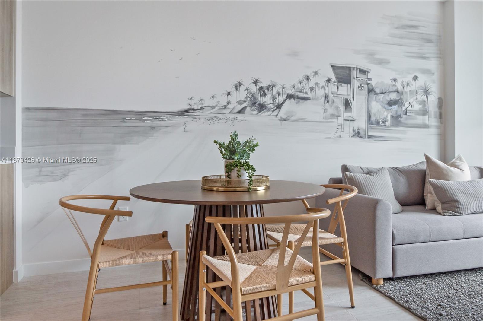 3900 Biscayne Boulevard, Unit S804 Miami, FL 33137 - Photo 5 of 36 a view of a dining room with furniture and wooden floor