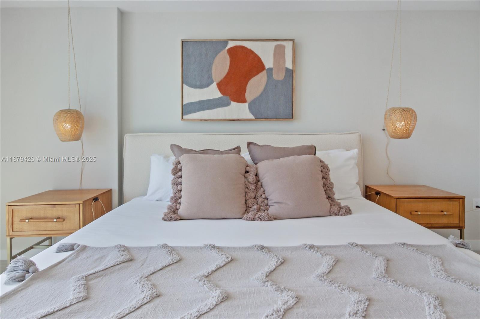 3900 Biscayne Boulevard, Unit S804 Miami, FL 33137 - Photo 8 of 36 a bedroom with a bed and painting on the wall