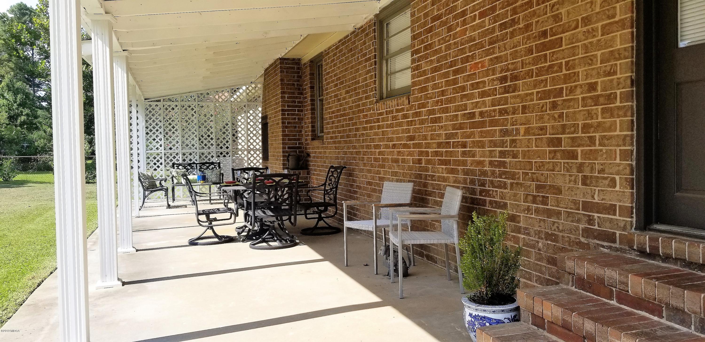 6609 Vinson Road Macon, GA 31216 - Photo 13 of 22 a view of balcony with chairs