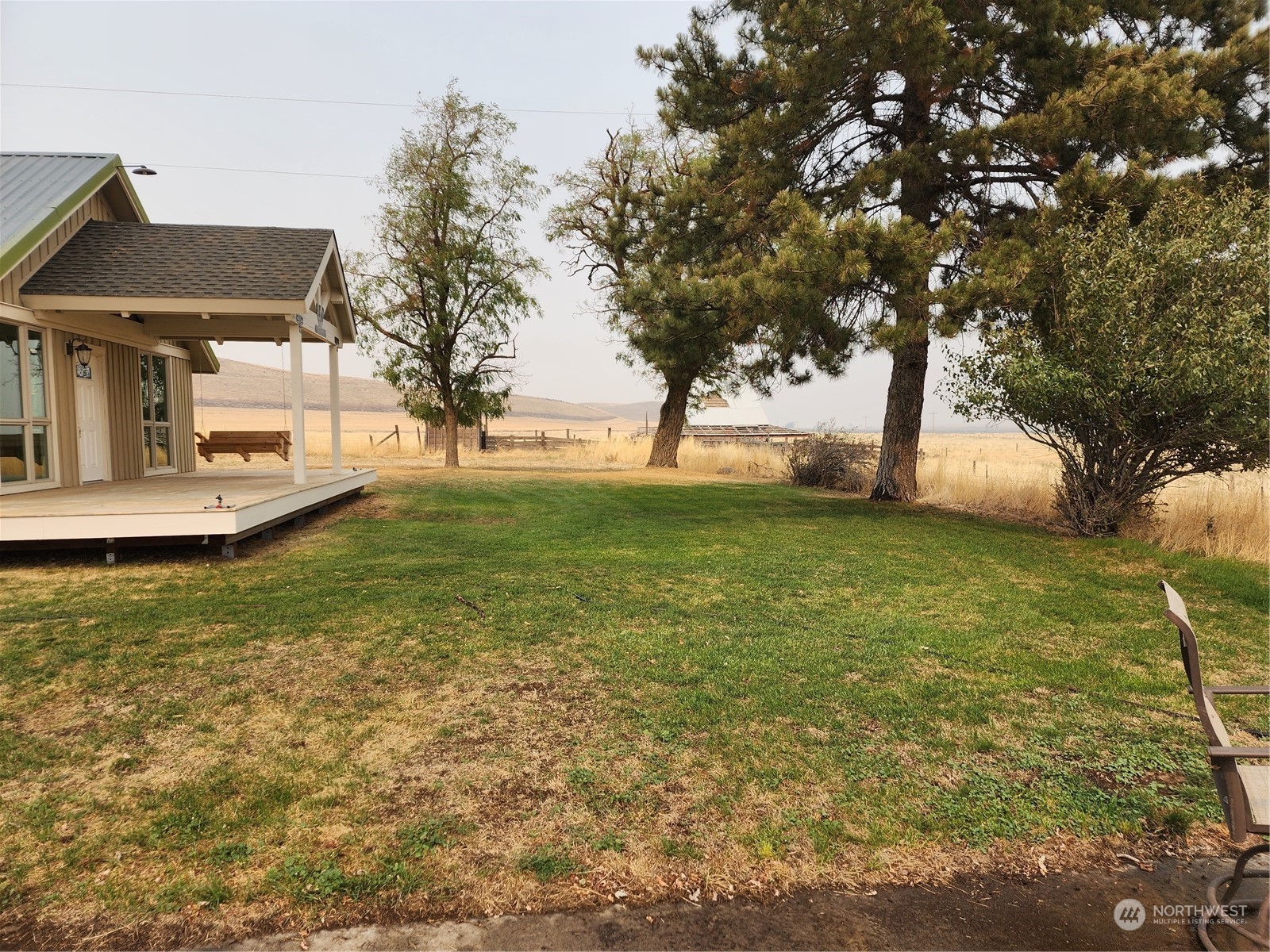 2946 East Ralston-Benge Road Benge, WA 99105 - Photo 3 of 4 a backyard of a house with lots of green space