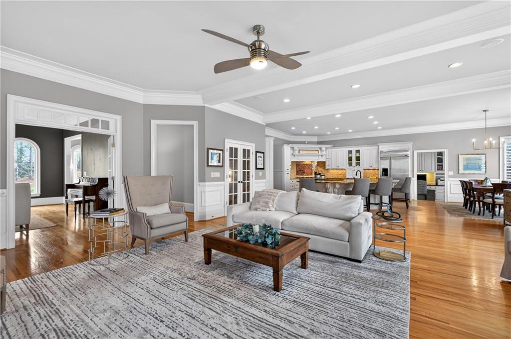 5040 Harrington Road Alpharetta, GA 30022 - Photo 13 of 54 a living room with furniture and wooden floor