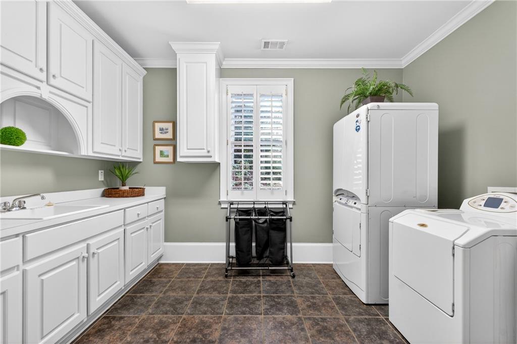 5040 Harrington Road Alpharetta, GA 30022 - Photo 20 of 54 a kitchen with refrigerator and window