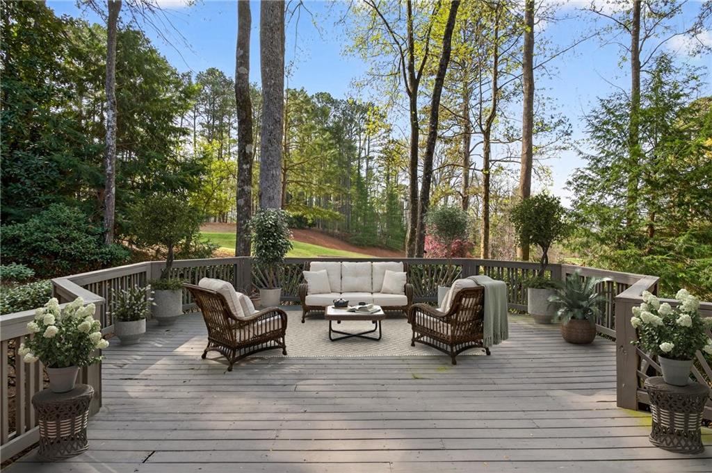 5040 Harrington Road Alpharetta, GA 30022 - Photo 2 of 54 a view of a terrace with seating area and furniture