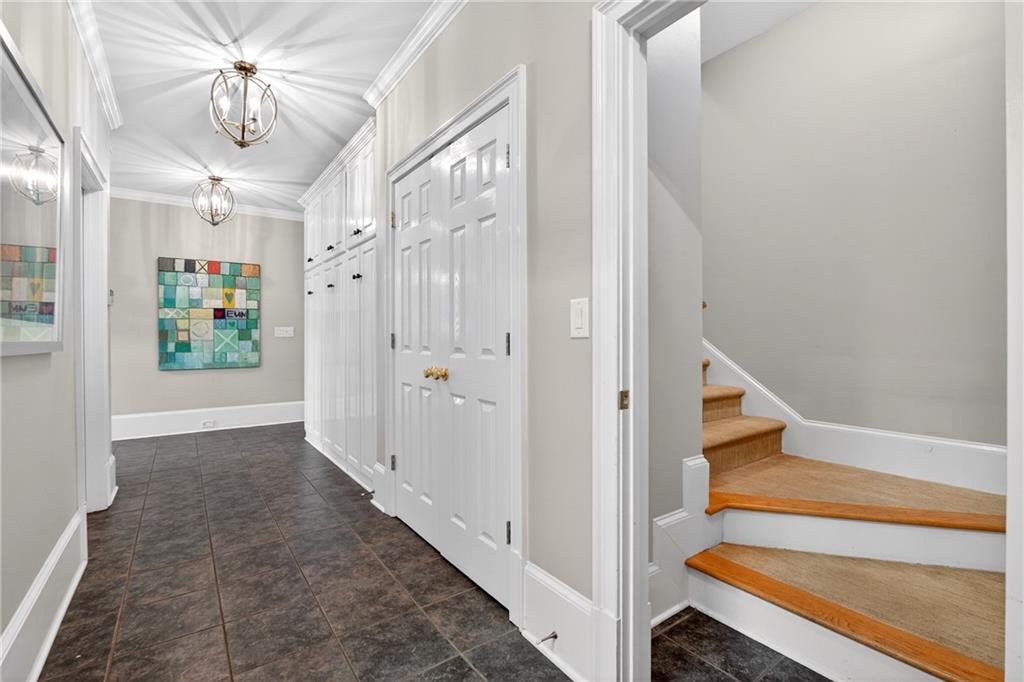 5040 Harrington Road Alpharetta, GA 30022 - Photo 21 of 54 a view of entryway with furniture and wooden floor