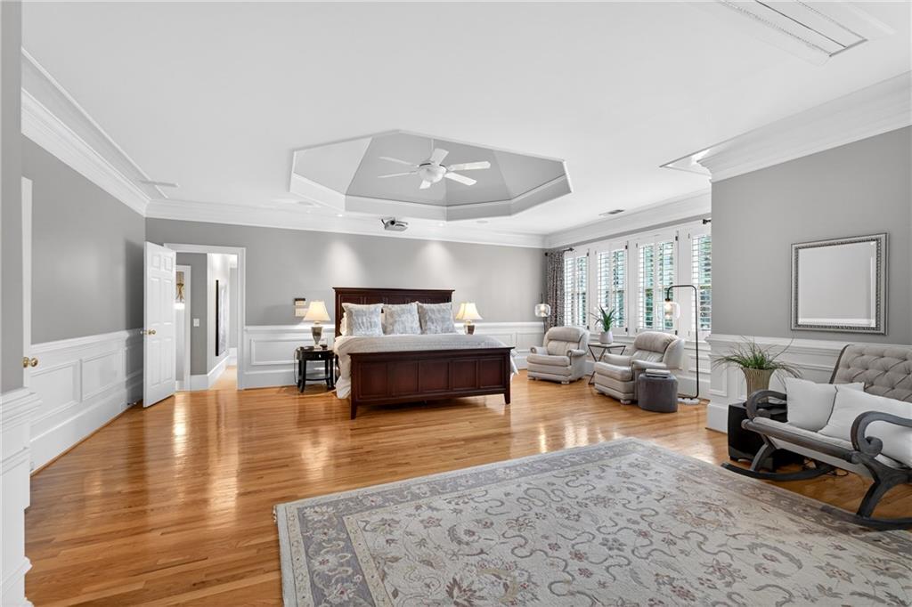 5040 Harrington Road Alpharetta, GA 30022 - Photo 23 of 54 a living room with furniture and a wooden floor