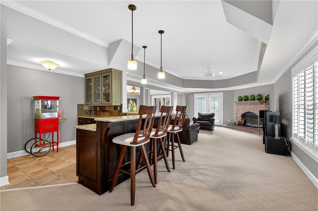 5040 Harrington Road Alpharetta, GA 30022 - Photo 39 of 54 a view of a dining room with furniture