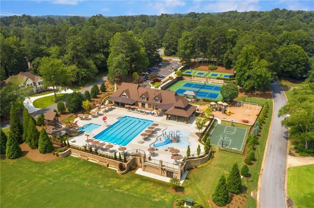 5040 Harrington Road Alpharetta, GA 30022 - Photo 50 of 54 an aerial view of a house with a garden and lake view