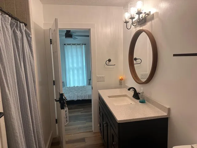 a view of balcony with furniture