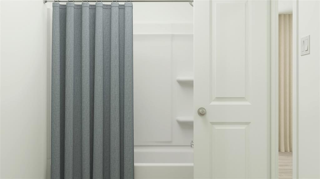 1721 Crossbill Street Forney, TX 75126 - Photo 19 of 24 a bathroom with bathtub and shower