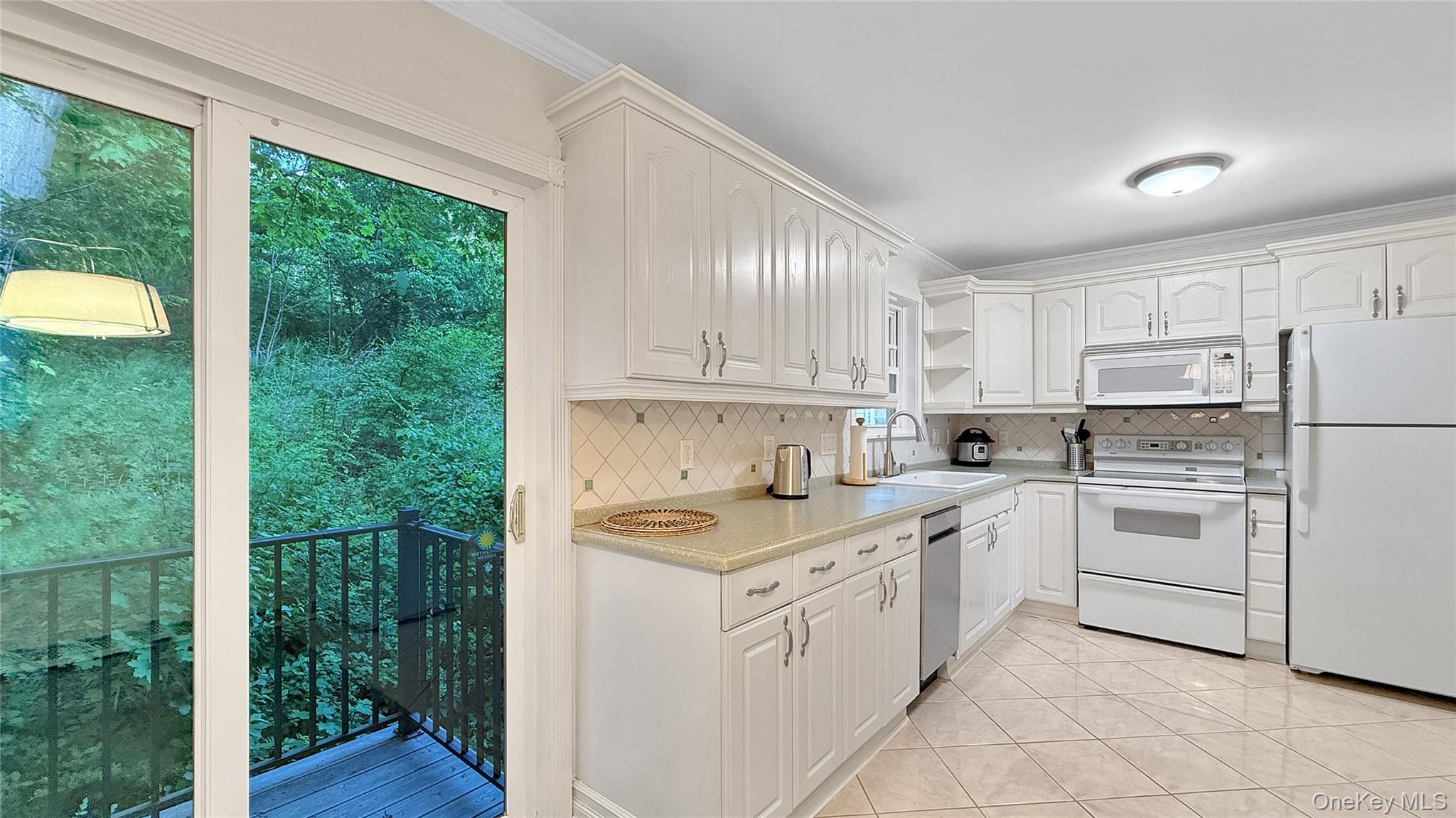 3 Forge Gate Drive, Unit B6A Cold Spring, NY 10516 - Photo 6 of 12 Kitchen with sliders to balcony