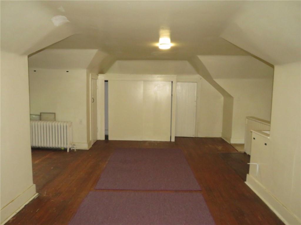 423 Braddock Road Pittsburgh, PA 15221 - Photo 32 of 36 a view of a livingroom with a staircase