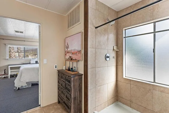 a en suite bathroom with a shower