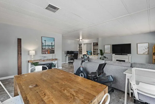 a bed room with a bed and a television