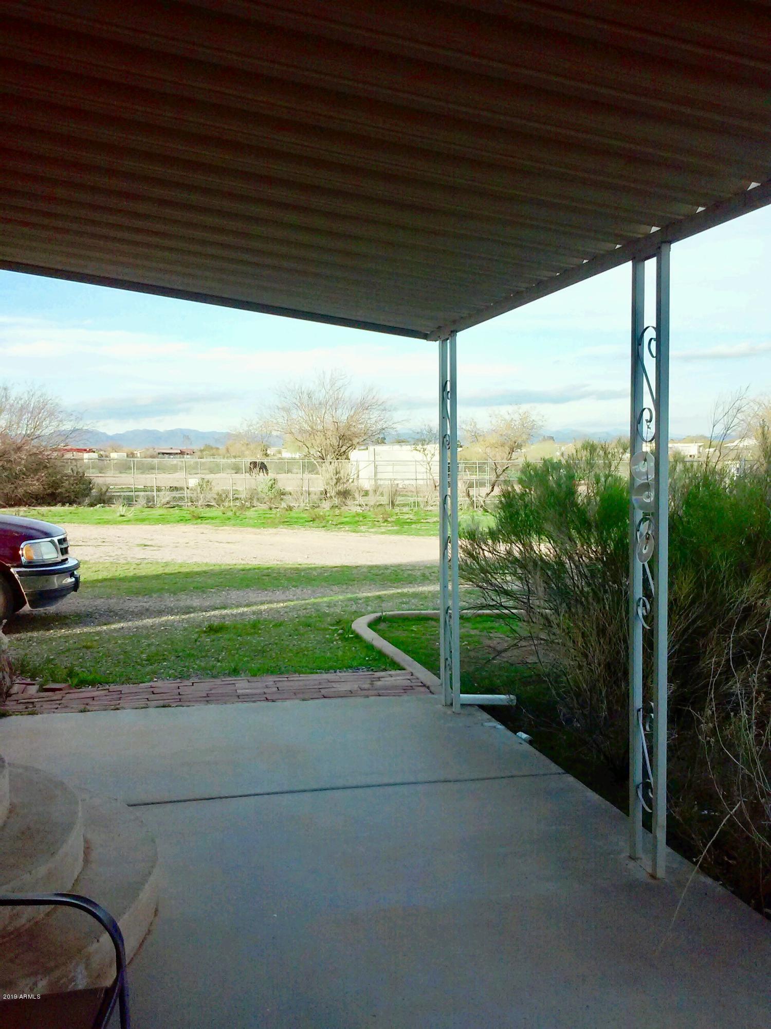 21022 West Silver Bell Road Wittmann, AZ 85361 - Photo 4 of 16 Covered patio