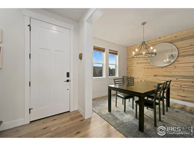 a view of dining table and chairs