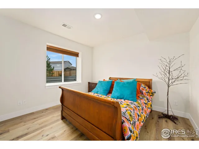 a bathroom with a bathtub a sink and a mirror