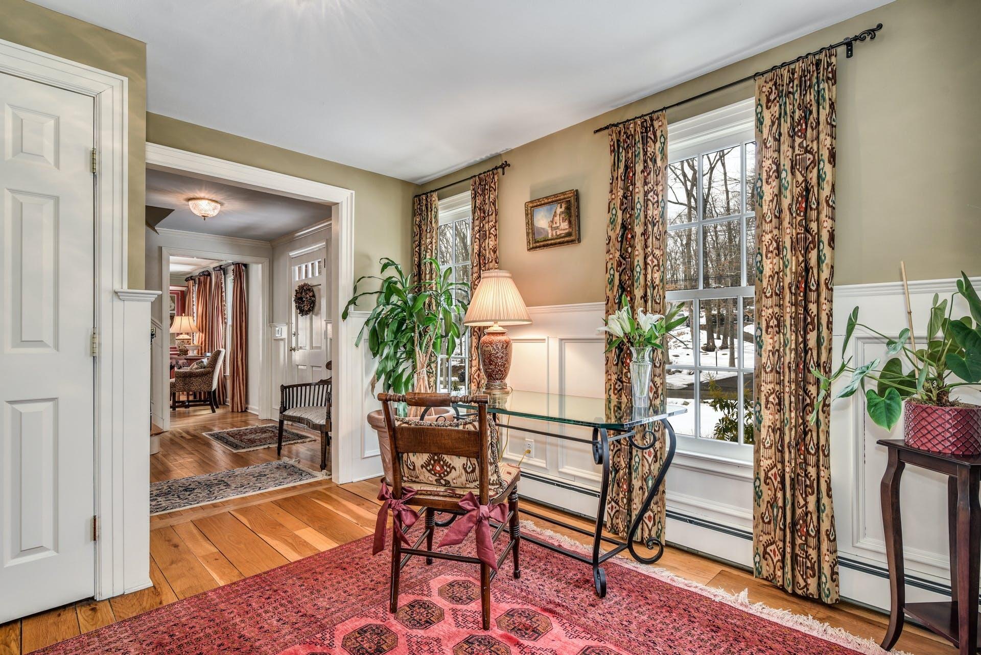 258 Jonathan Road New Canaan, CT 06840 - Photo 18 of 33 a dining room with furniture and wooden floor