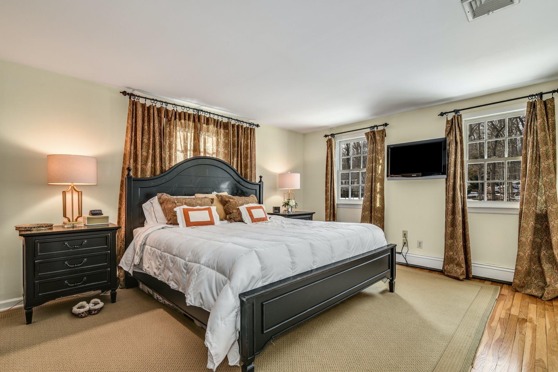 258 Jonathan Road New Canaan, CT 06840 - Photo 20 of 33 a bedroom with a bed and a window