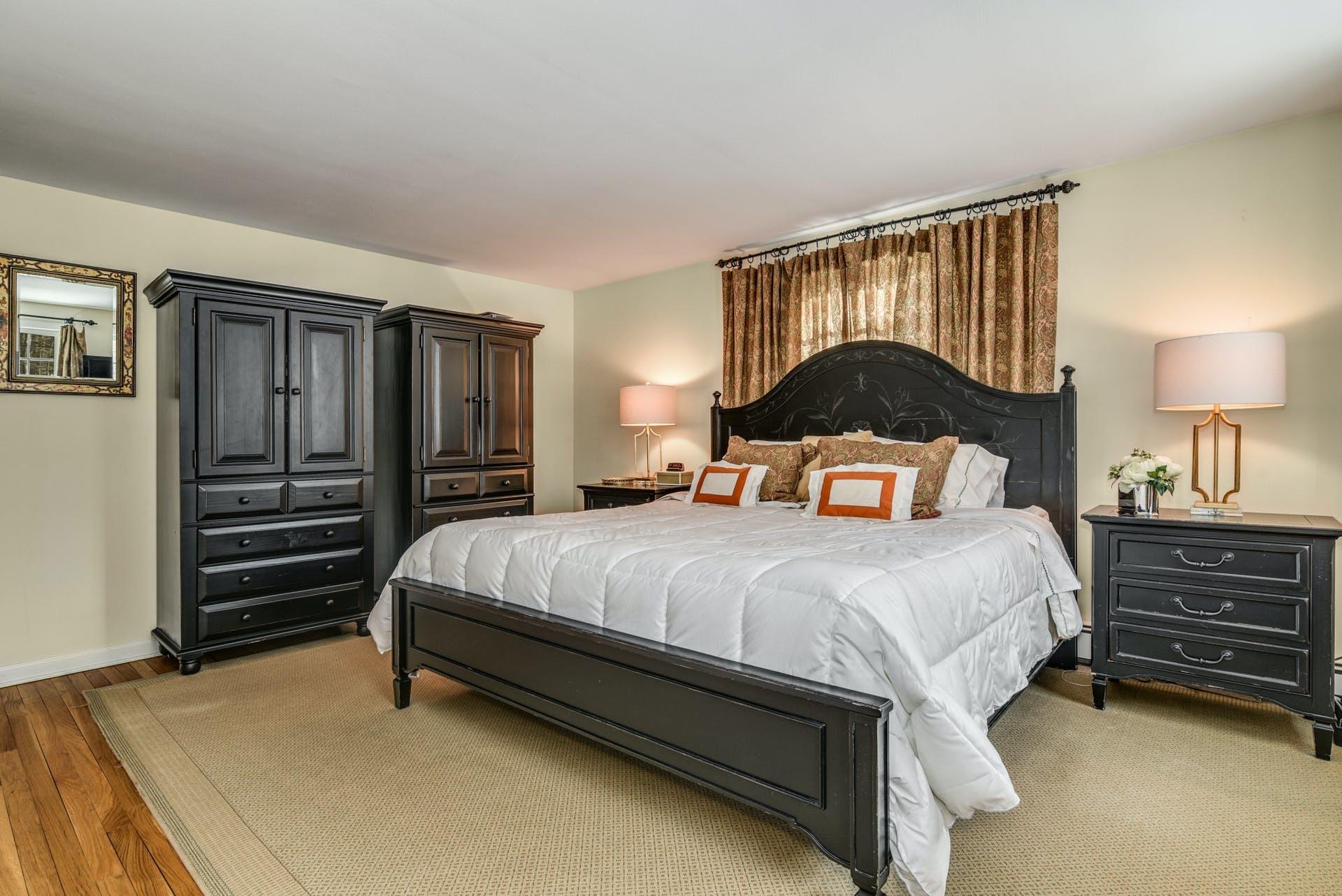 258 Jonathan Road New Canaan, CT 06840 - Photo 21 of 33 a bedroom with a bed and a dresser
