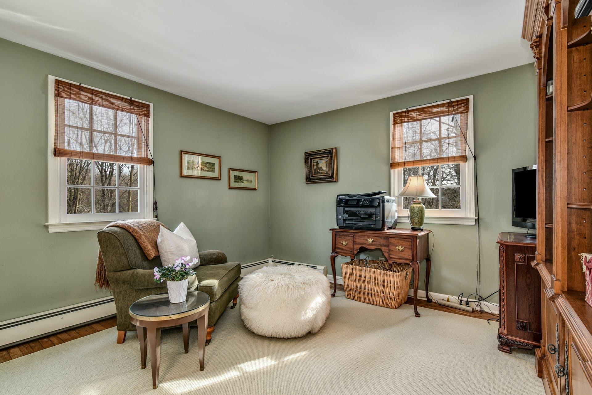 258 Jonathan Road New Canaan, CT 06840 - Photo 24 of 33 a living room with furniture and a window