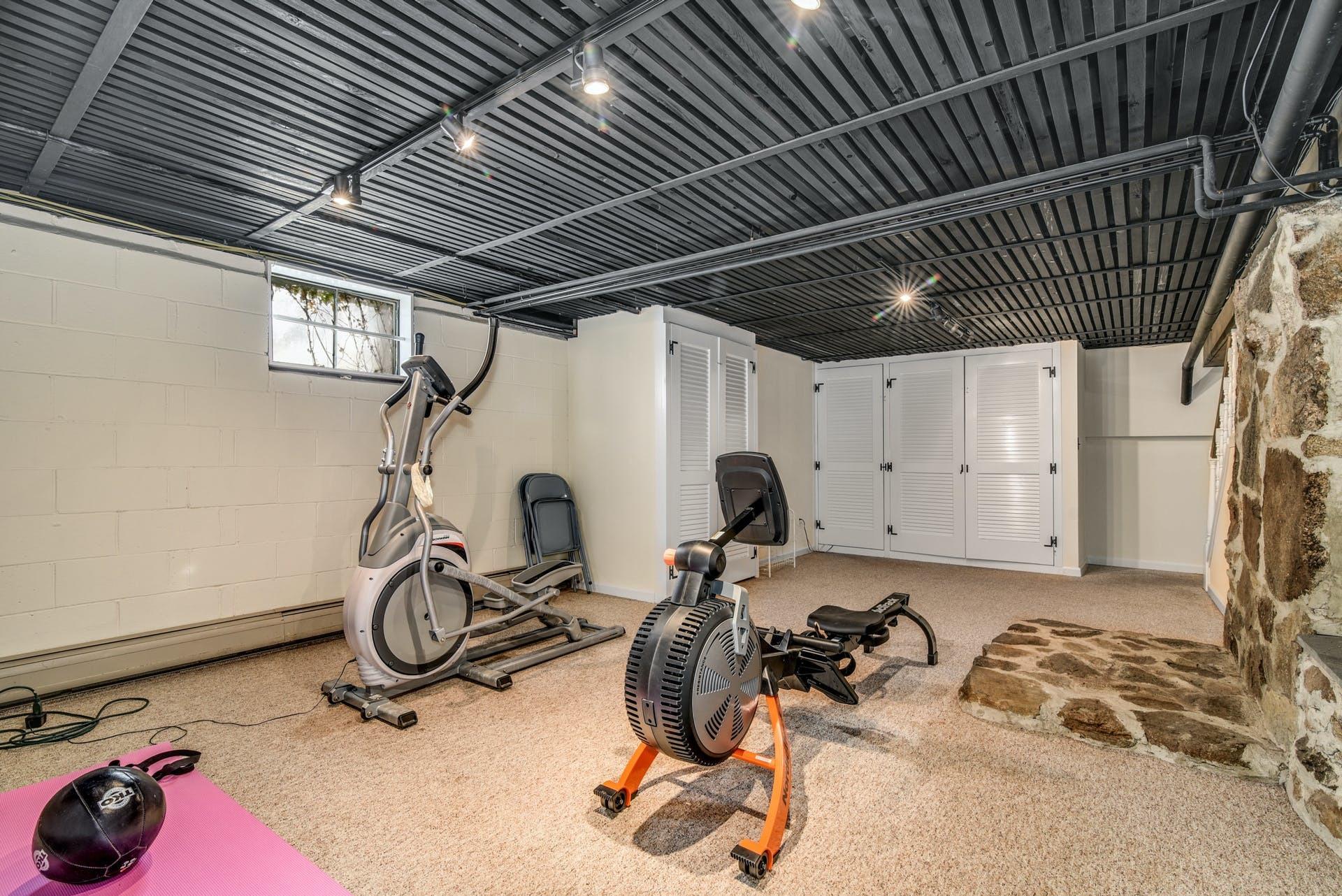 258 Jonathan Road New Canaan, CT 06840 - Photo 25 of 33 a view of a room with gym equipment