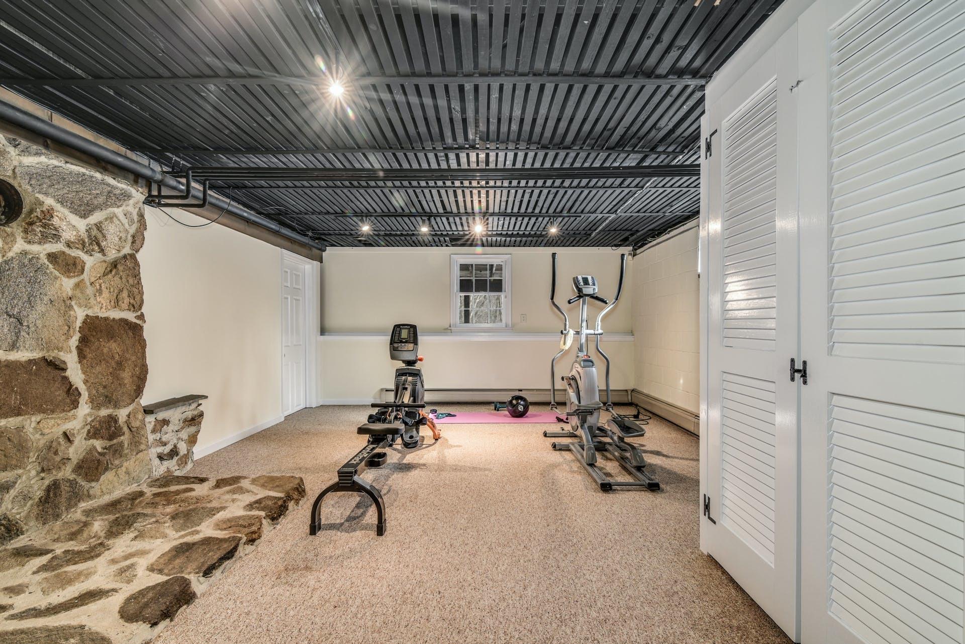 258 Jonathan Road New Canaan, CT 06840 - Photo 26 of 33 a view of a room with gym equipment
