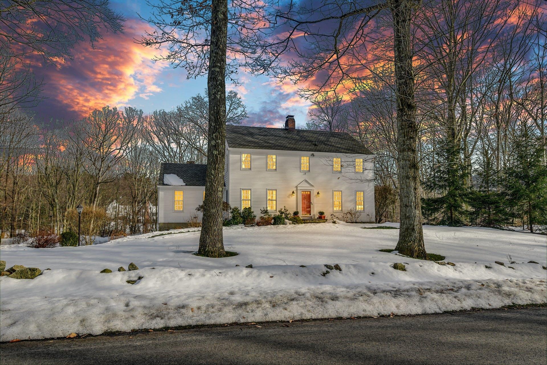 258 Jonathan Road New Canaan, CT 06840 - Photo 30 of 33 a front view of a house with street