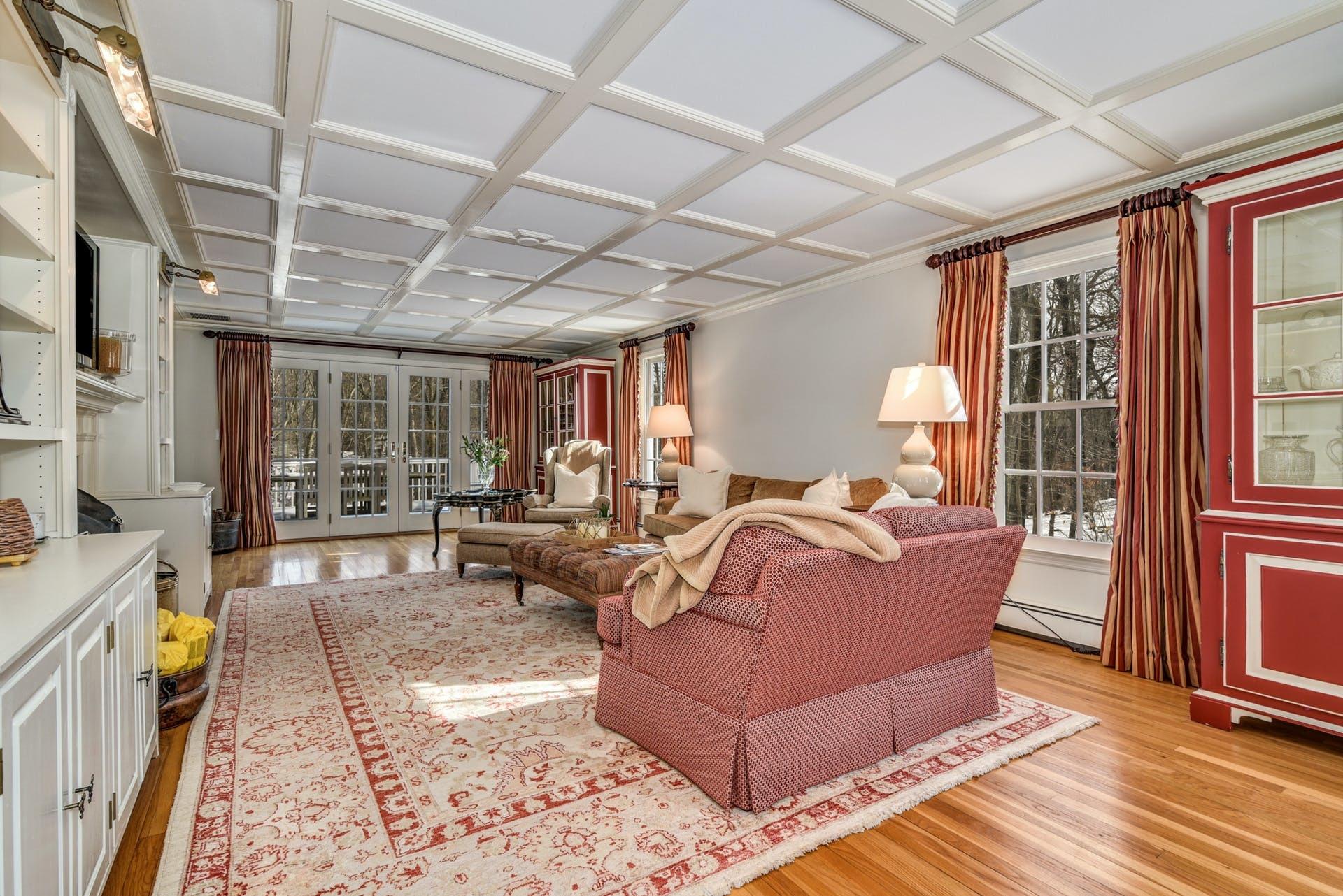 258 Jonathan Road New Canaan, CT 06840 - Photo 7 of 33 a living room with furniture rug and wooden floor