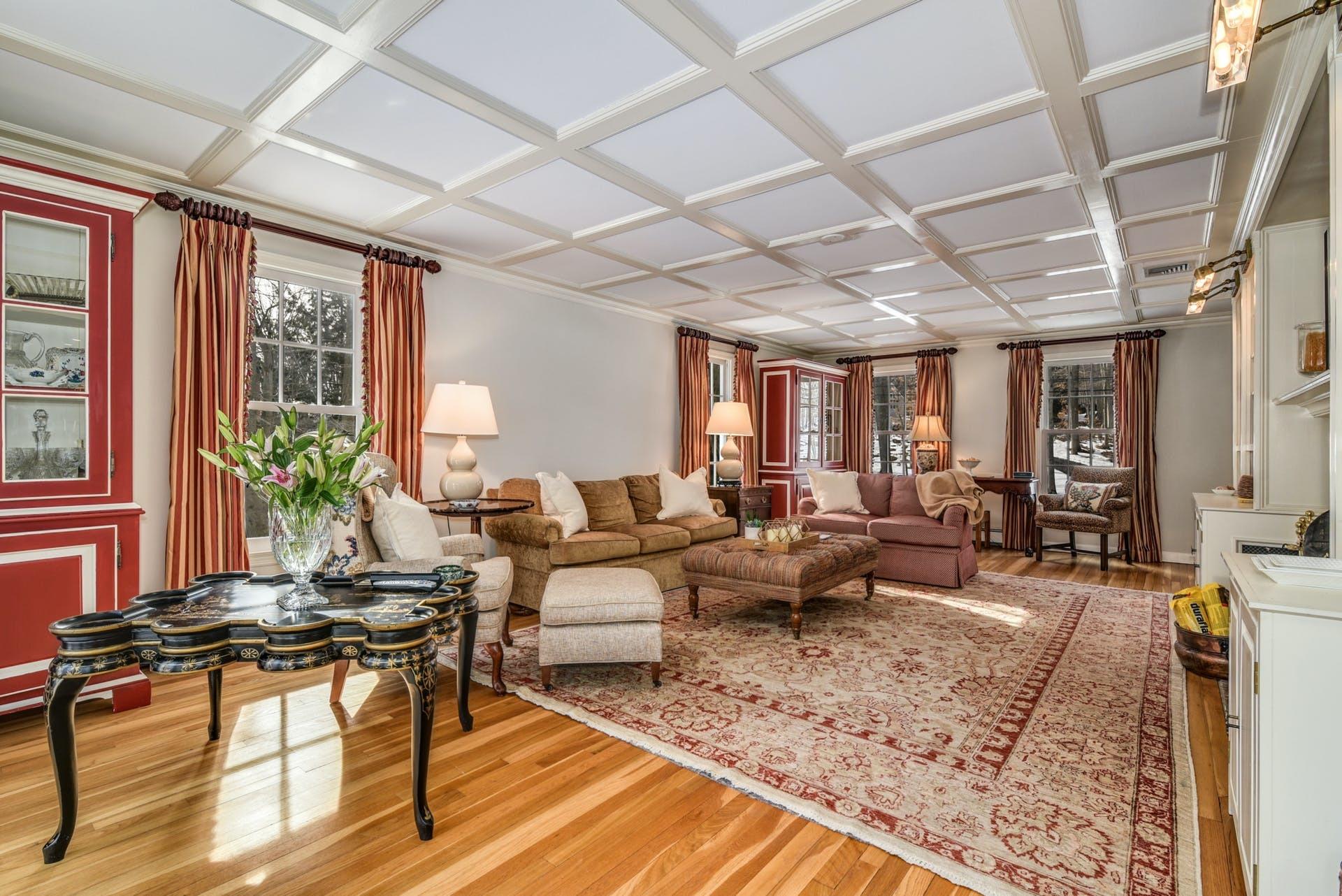 258 Jonathan Road New Canaan, CT 06840 - Photo 9 of 33 a living room with furniture or couch and a table