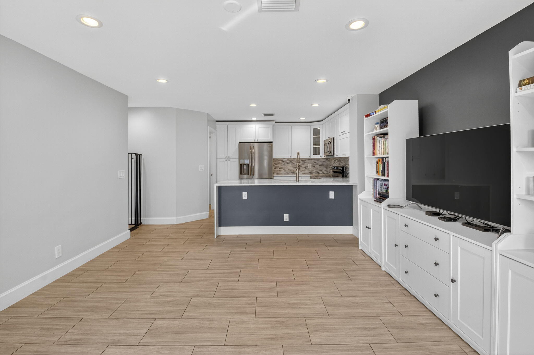 2226 Northwest 52nd Street Boca Raton, FL 33496 - Photo 20 of 49 a view of kitchen with refrigerator microwave and cabinets