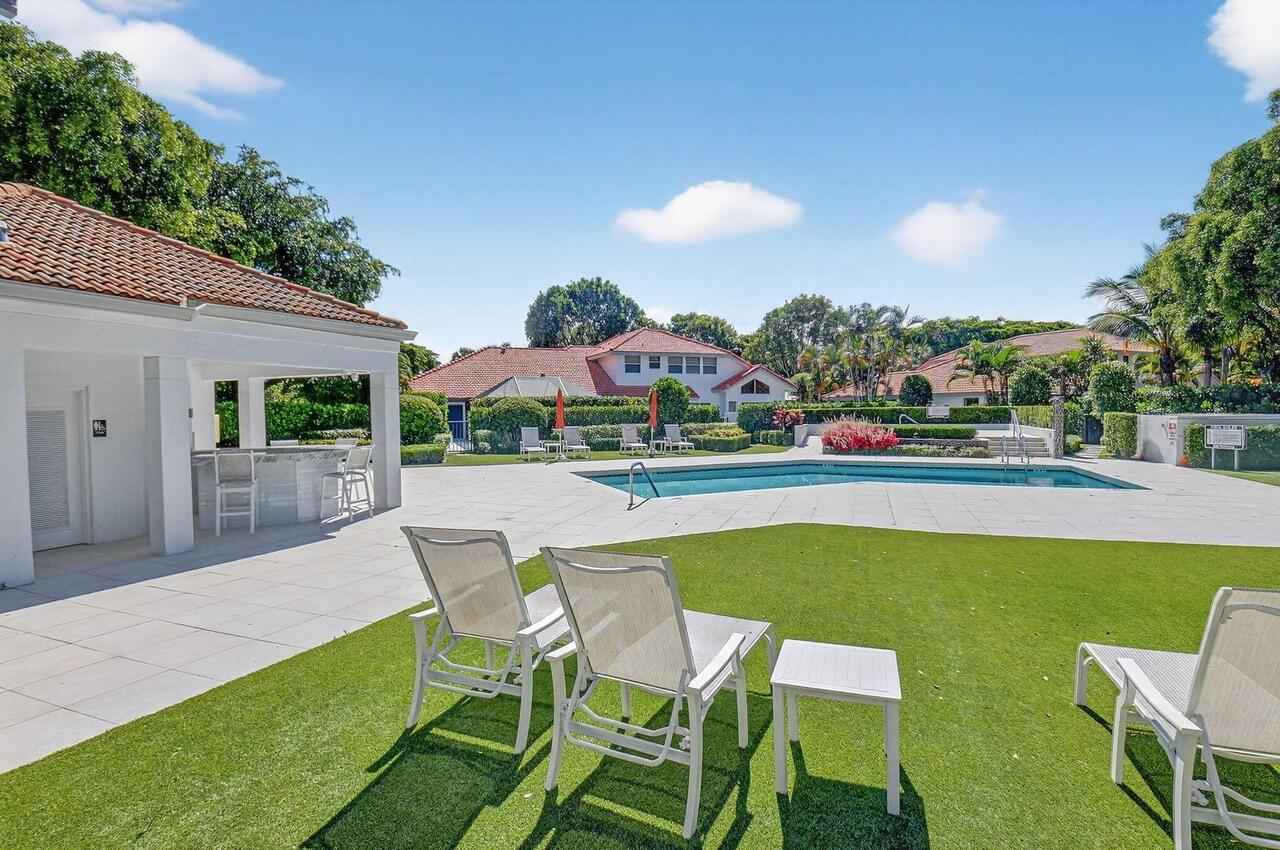 2226 Northwest 52nd Street Boca Raton, FL 33496 - Photo 33 of 49 a view of an chairs and tables in the patio