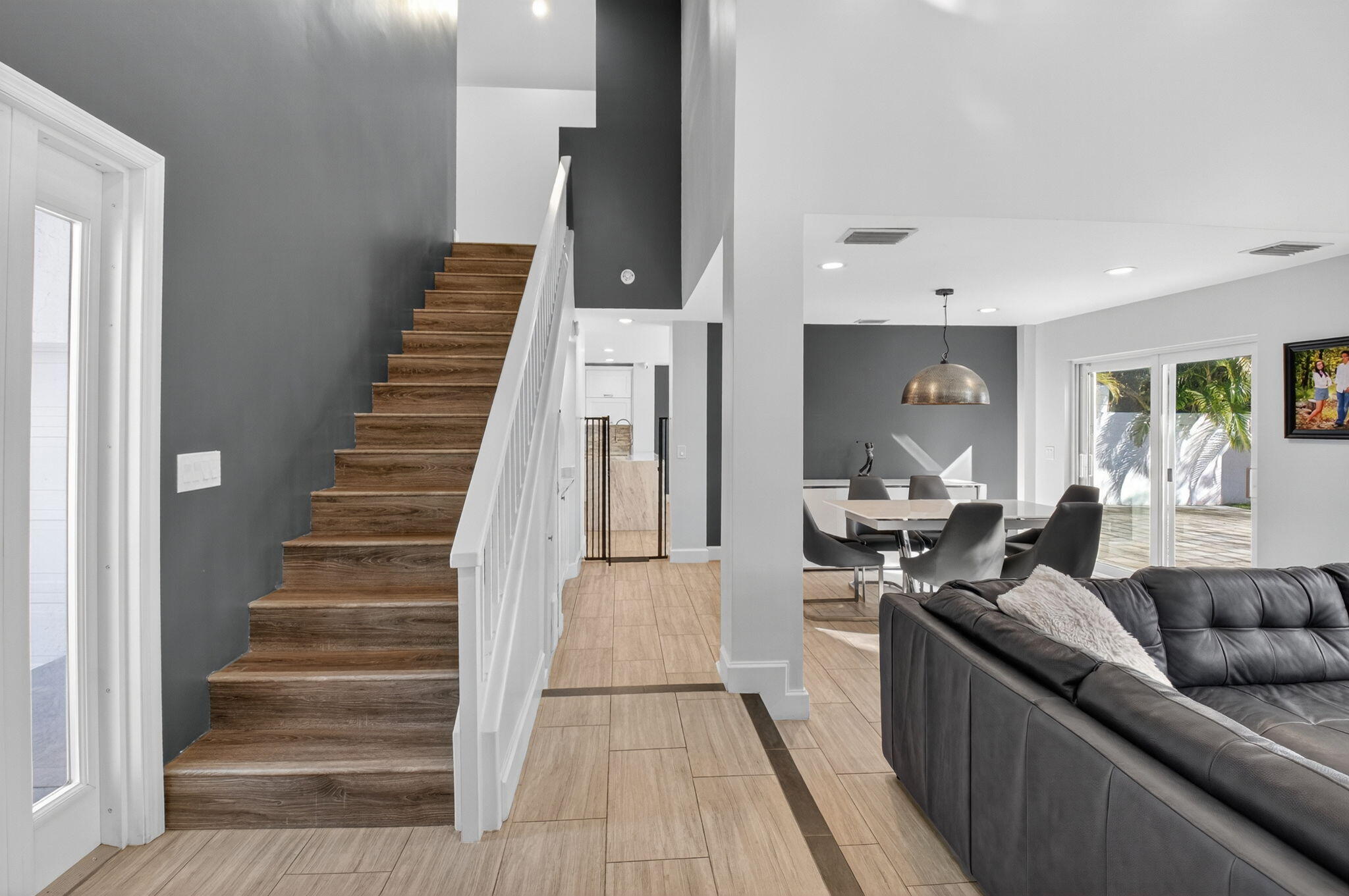 2226 Northwest 52nd Street Boca Raton, FL 33496 - Photo 5 of 49 a living room with furniture and a fireplace